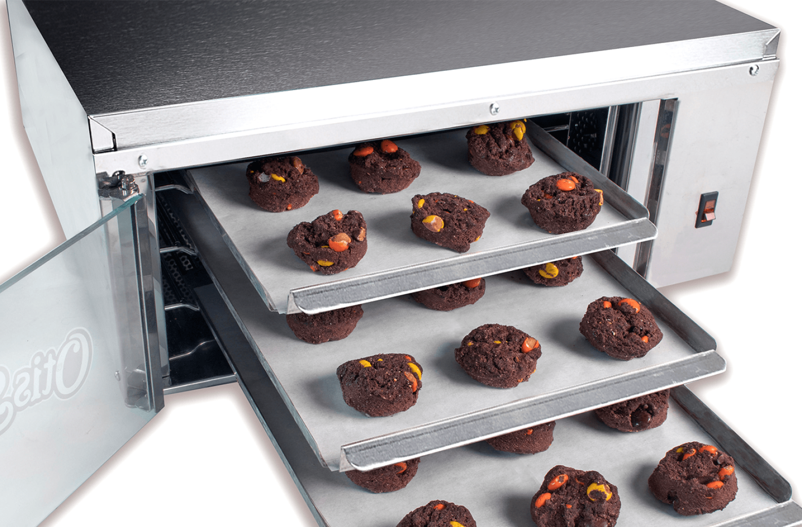 oven with trays of cookies