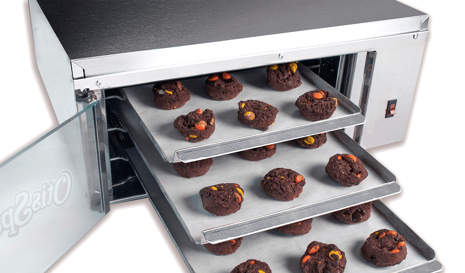 oven with trays of cookies