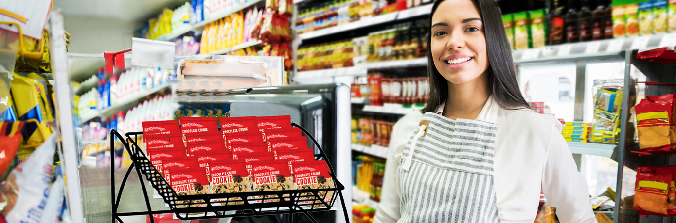 convenient store worker next to display rack