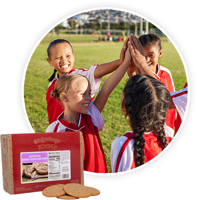 kids playing soccer and high-fiving